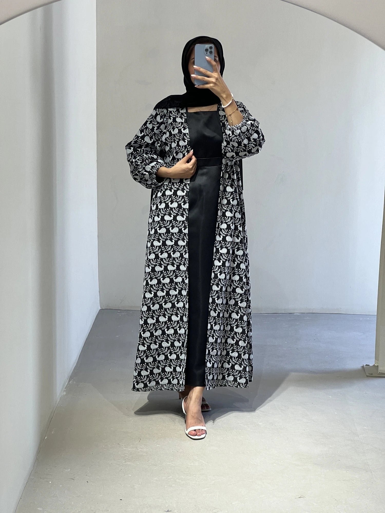 Elegant luxury abaya Dubai in black and white floral design, perfect for special occasions
