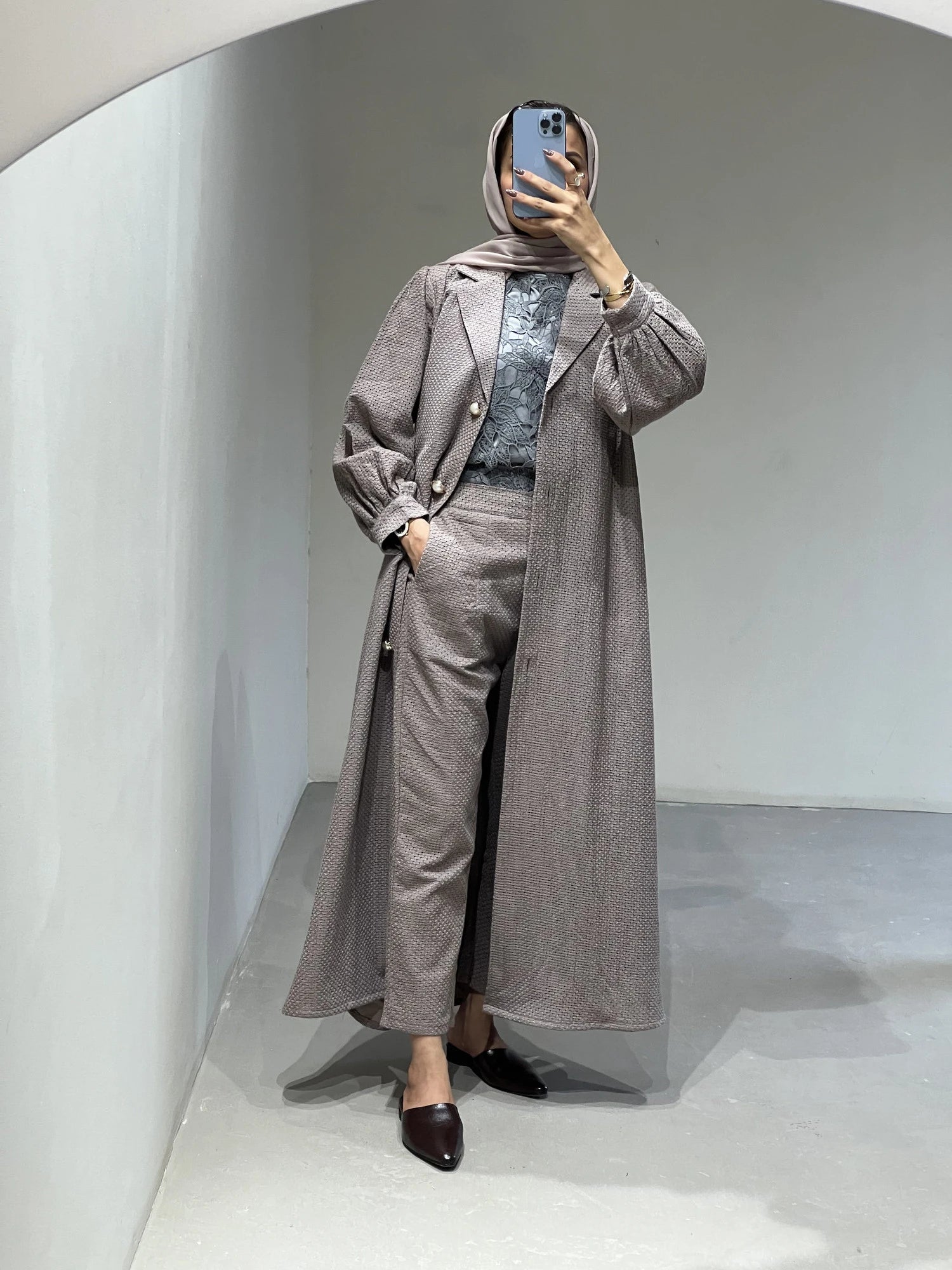 Stylish luxury abaya set Dubai featuring a long coat and matching trousers for elegant occasions