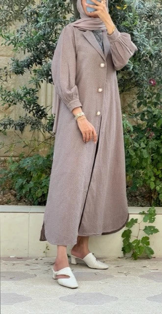 Elegant luxury abaya set Dubai in soft fabric with stylish buttons for a chic look