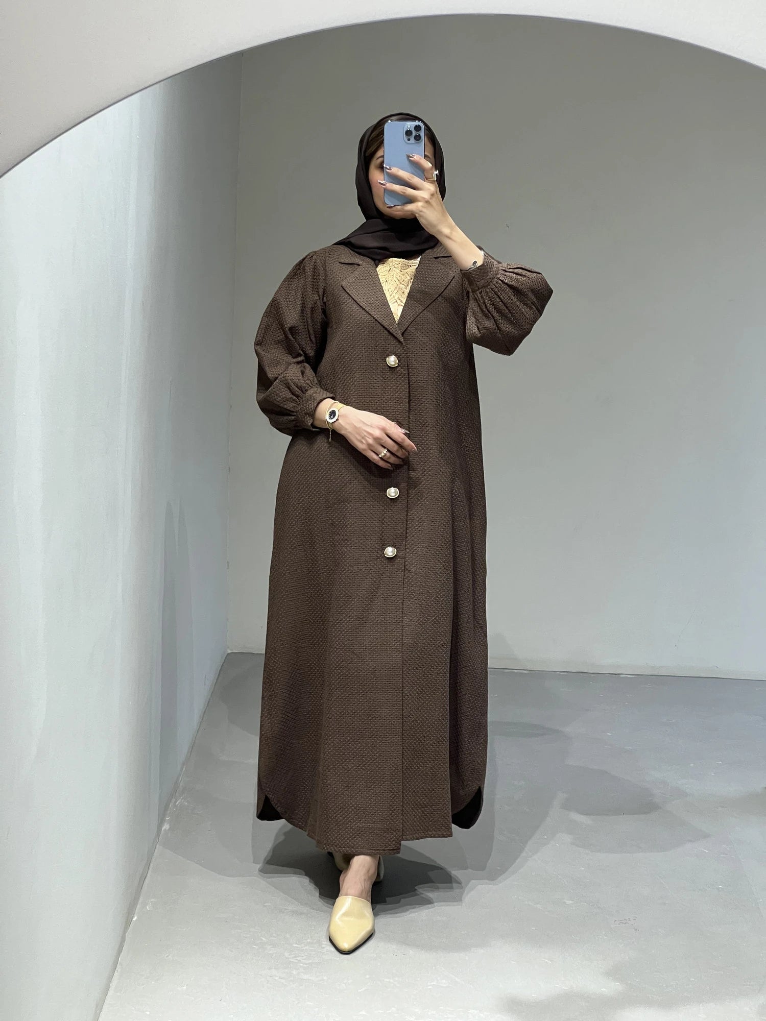 Elegant brown luxury abaya set Dubai with button details and a stylish silhouette for modern wear