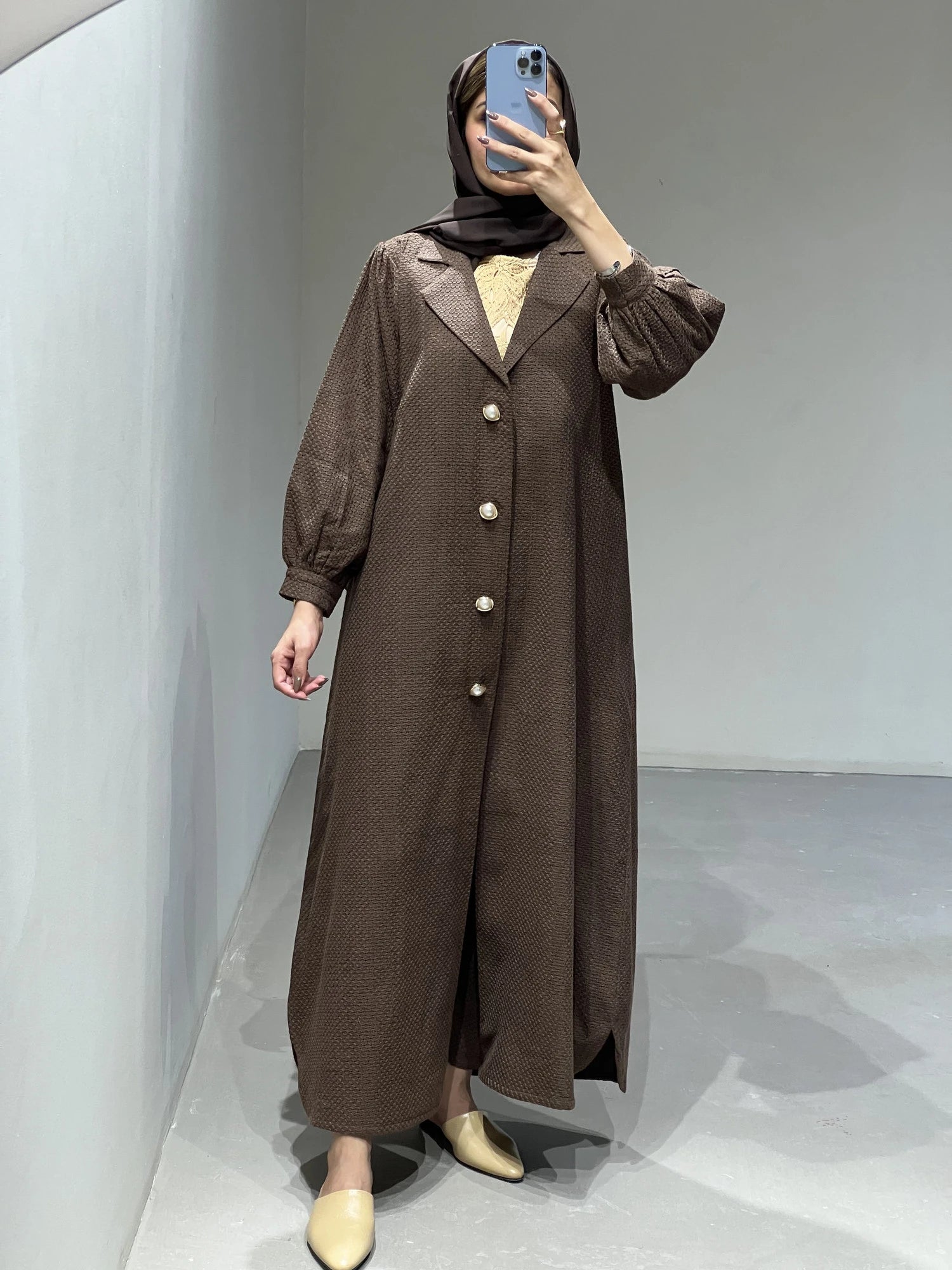 Elegant Contessa Collection luxury abaya set Dubai in rich brown with button details and flowing sleeves