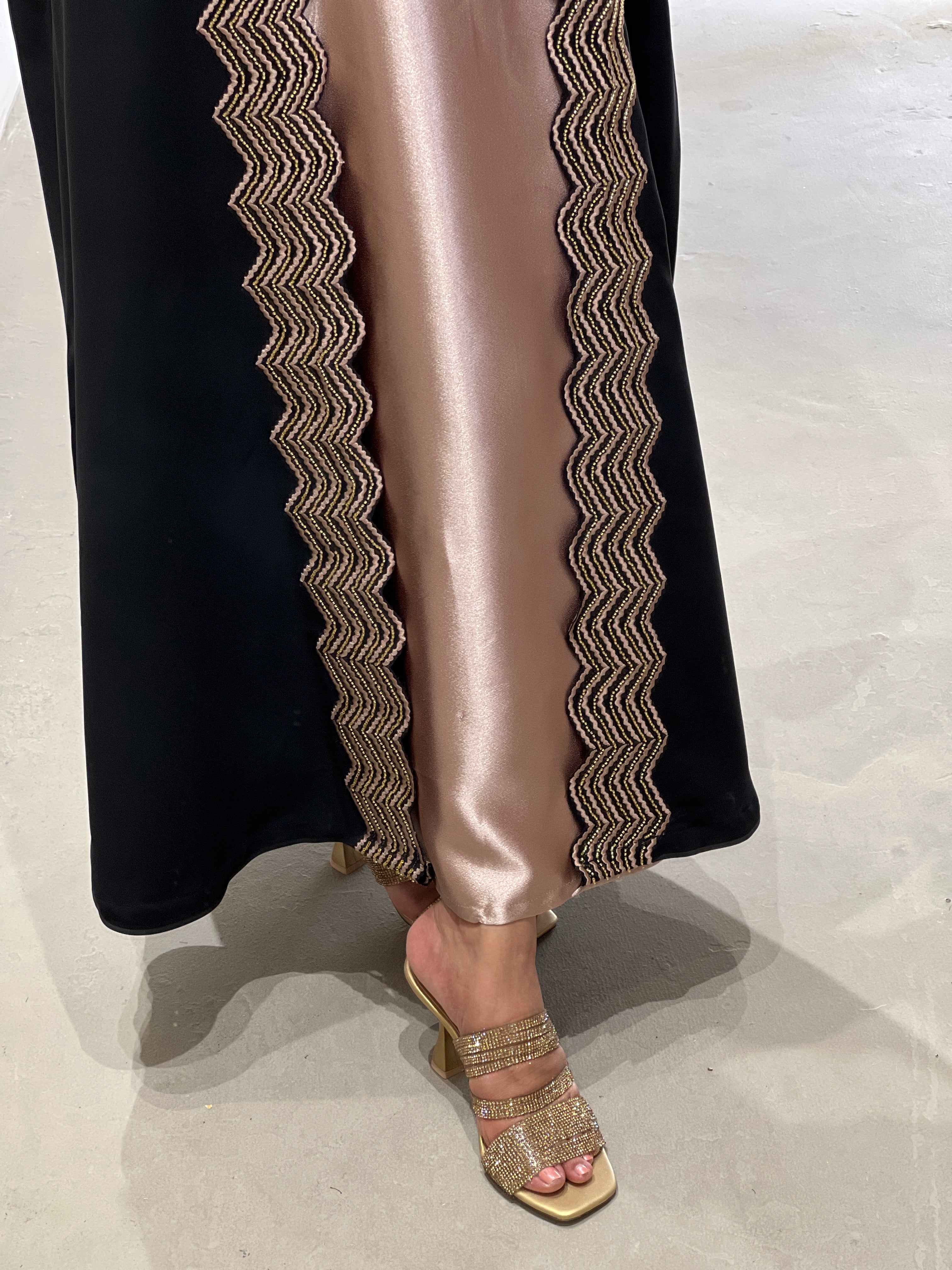 Elegant luxury abaya set with dress and sheila showcasing intricate detailing and stylish footwear
