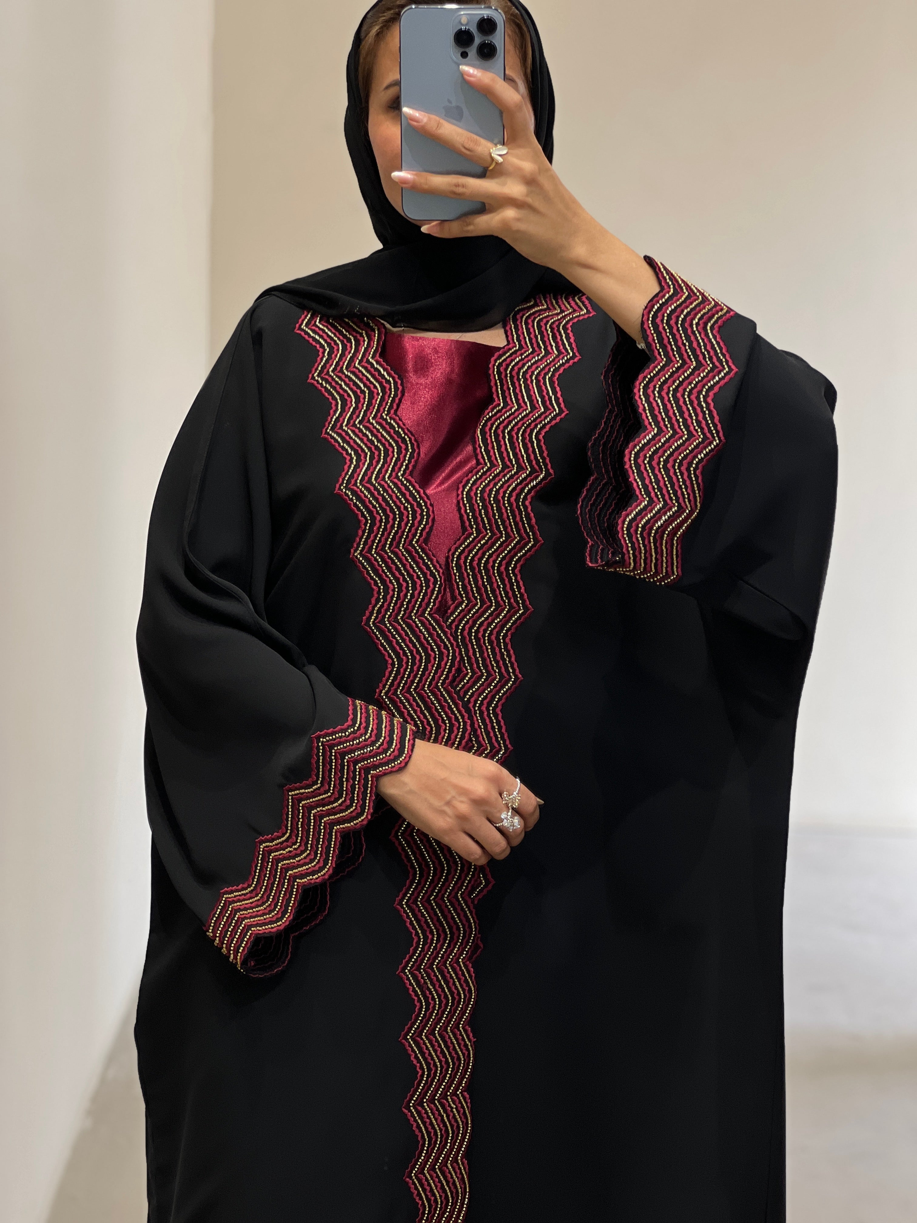 Elegant luxury abaya set with dress and sheila featuring intricate red zigzag embroidery