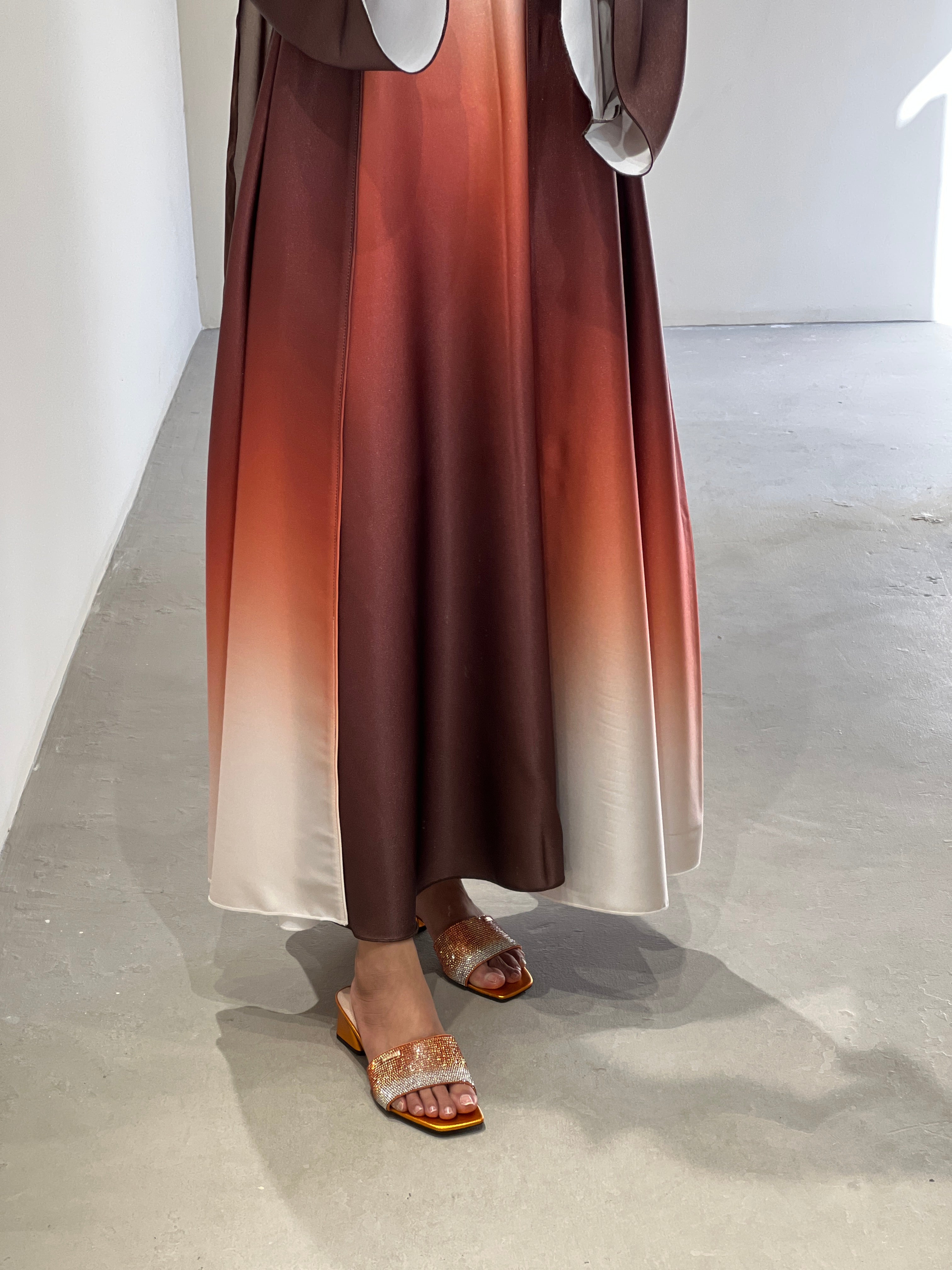 Elegant multicolor fade abaya Dubai featuring a stylish gradient design and matching sandals