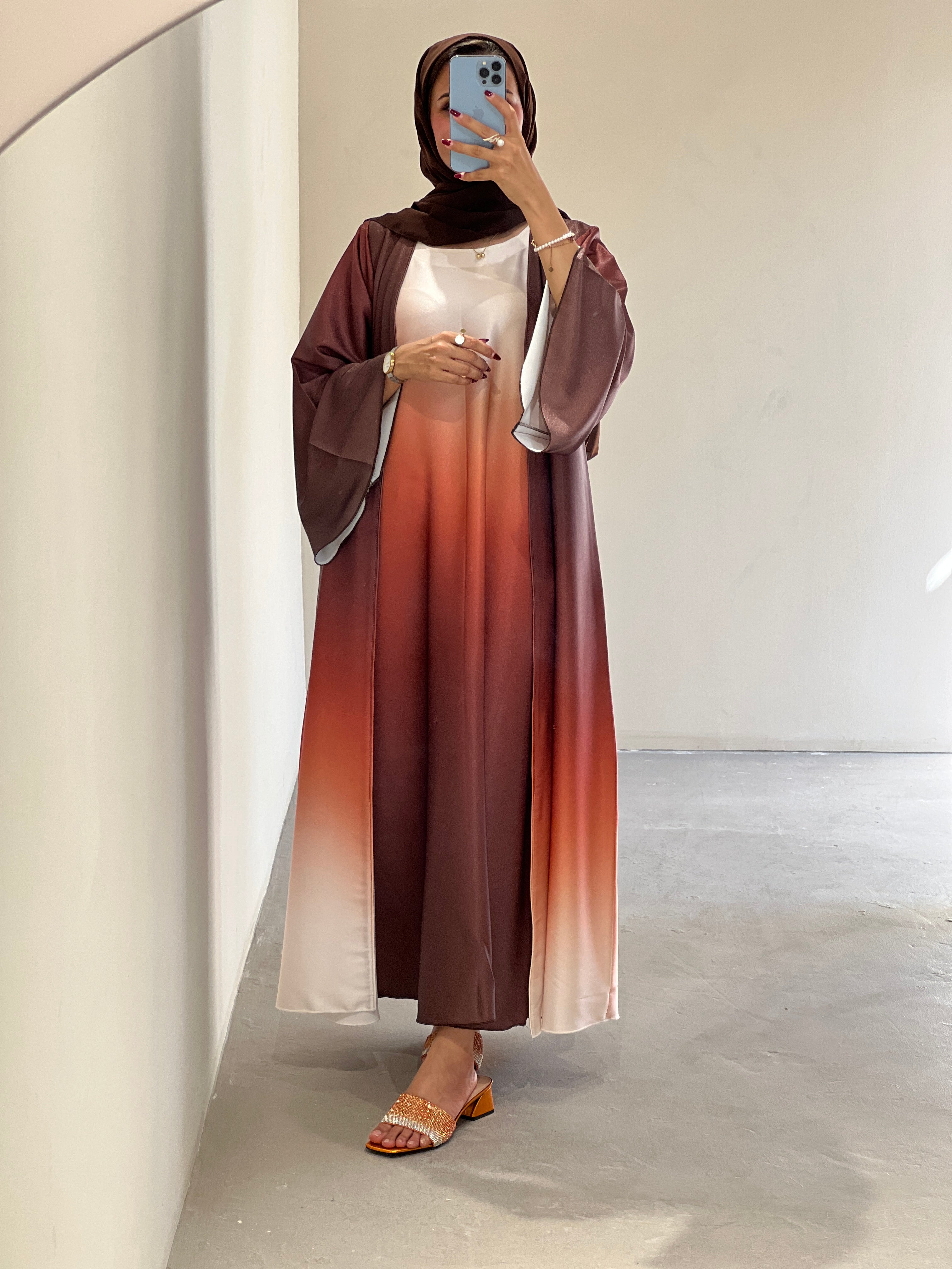 Elegant multicolor fade abaya Dubai with flowing sleeves and a gradient design for stylish wear