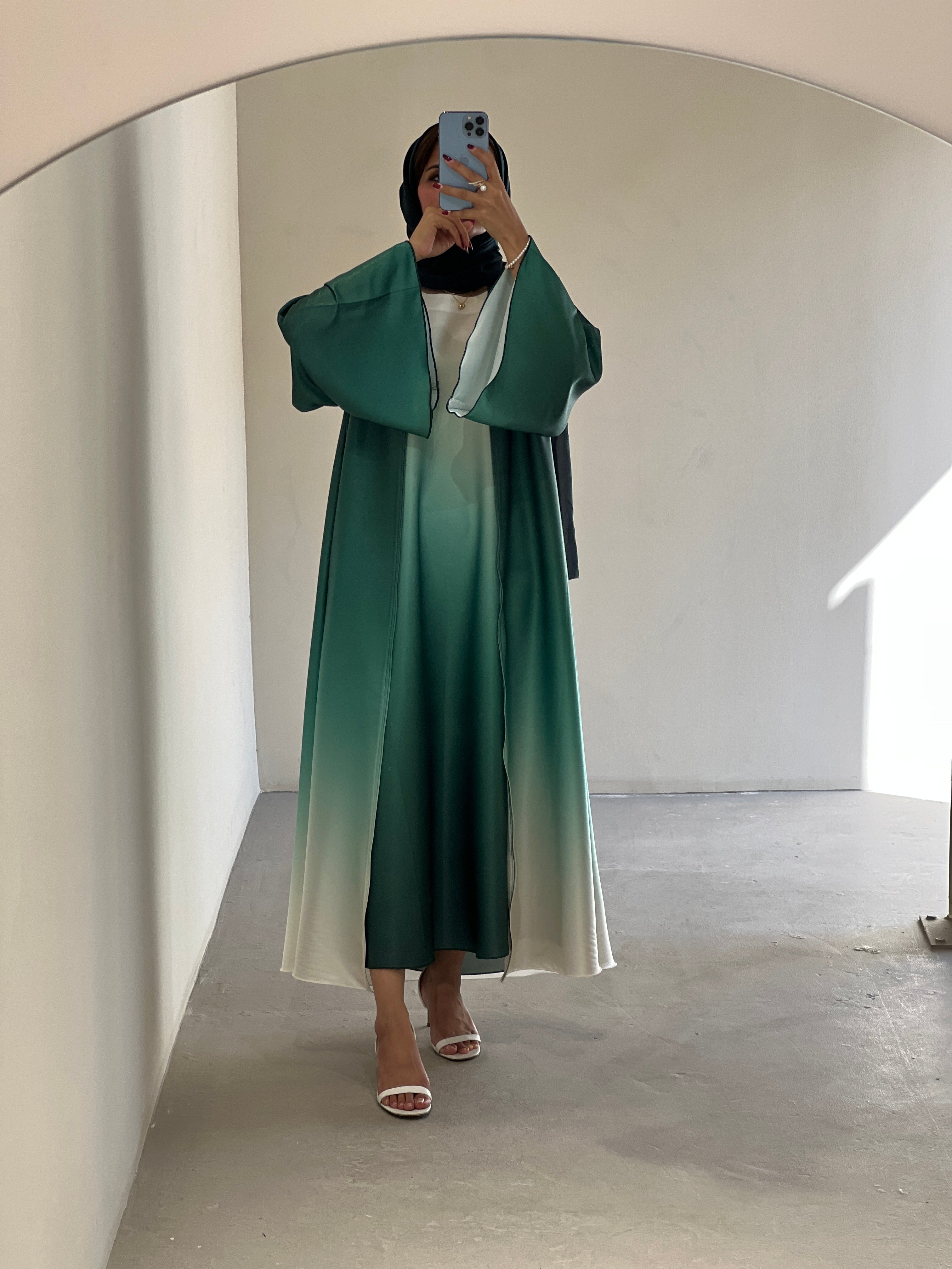 Elegant multicolor fade abaya Dubai featuring a stylish gradient design and flowing sleeves