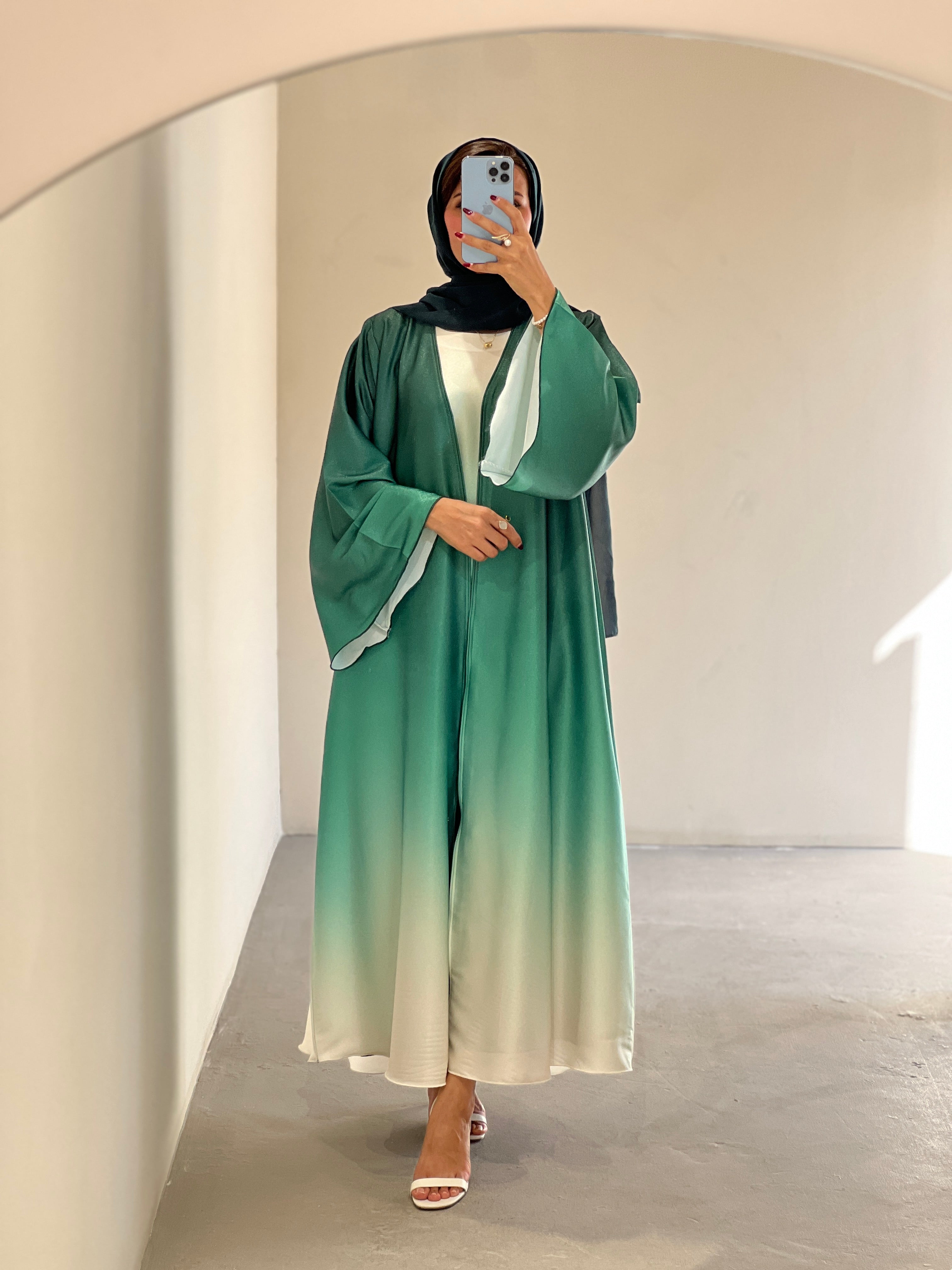 Elegant multicolor fade abaya Dubai with bell sleeves and a flowing design for modern style.